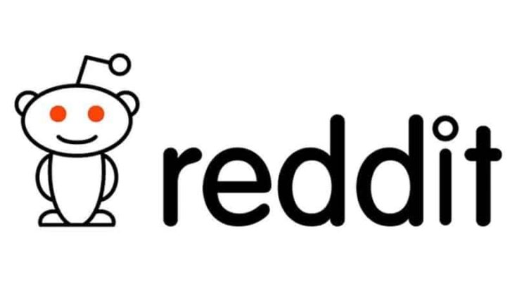 Logo of Reddit featuring a stylized white cartoon figure with an antenna and red eyes, next to the lowercase text "We are now on Reddit" in black.