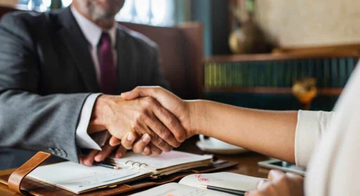 businessmen shaking hands on a deal