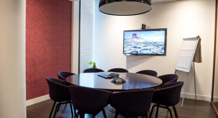 teleconference meeting room with table and chairs