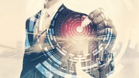 A double exposure image featuring a businessman pointing at a futuristic holographic interface overlaid on a cityscape, symbolizing a career in advanced technology and urban development.