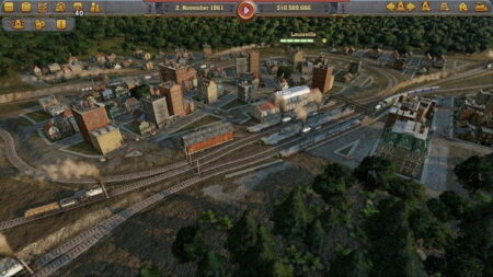 Aerial view of a virtual cityscape from Railway Empire, depicting an industrial town with train tracks, multiple buildings, and dense forests surrounding the area. The heads-up display shows date and financial stats.