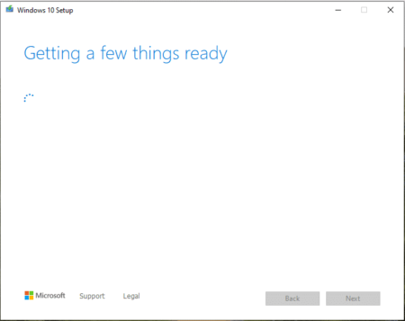 A screenshot of the Windows 8.1 setup screen displaying the message "getting a few things ready" with a loading symbol, Microsoft logo, and navigation buttons at the bottom.