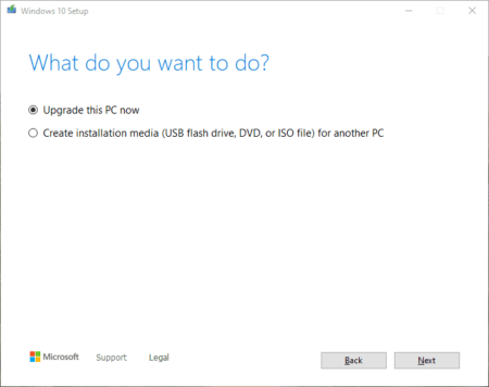 Screenshot of the Windows setup window with two options displayed: "upgrade this PC now" and "create installation media (USB flash drive, DVD, or ISO file) for another PC.