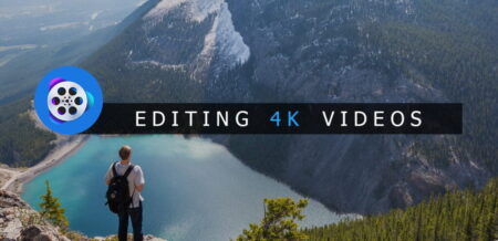 A person with a backpack stands overlooking a breathtaking mountainous landscape with a turquoise lake below. Overlay text reads "editing 4K videos" with the VideoProc logo.