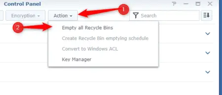 A screenshot of a Synology computer control panel window with a dropdown menu under "action" highlighted by a red arrow pointing to the option "empty all recycle bins.