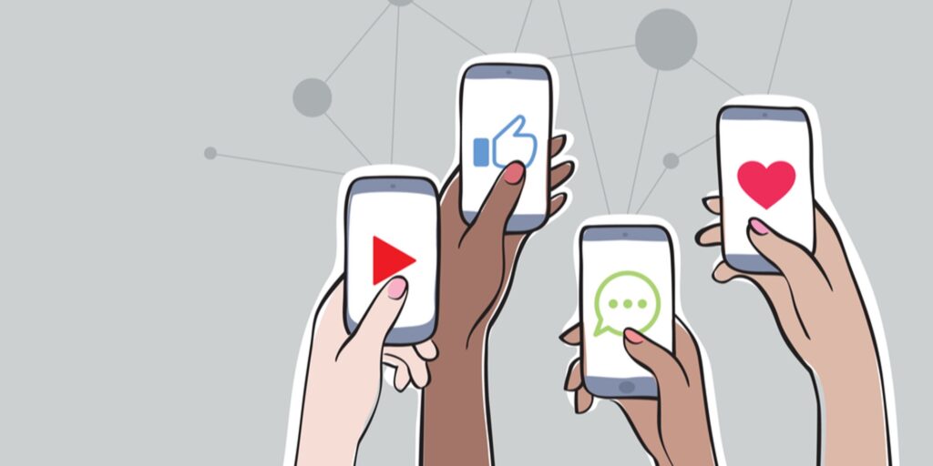 Illustration of multiple hands holding smartphones, each displaying different social media platforms icons like a thumbs-up, a heart, a play button, and a speech bubble on the screens, against a background of connected