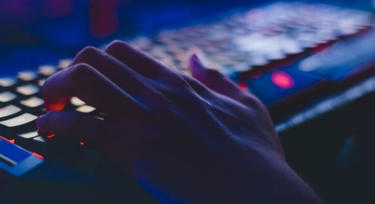 photo of person typing on computer keyboard