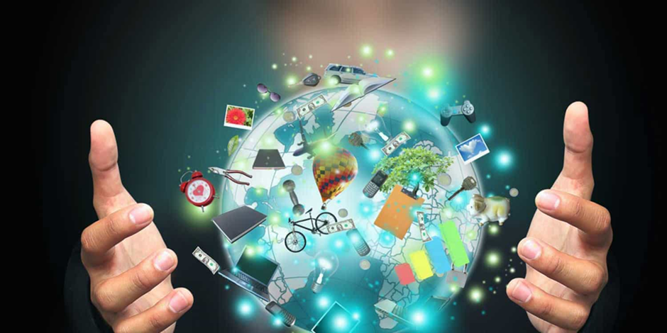 Two hands framing a holographic globe surrounded by various icons representing technological advances, nature, and everyday objects, symbolizing global connectivity and digital integration.