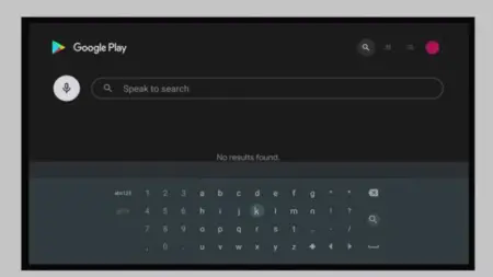 Screenshot of the Android TV Google Play Store interface showing a "no results found" message with an on-screen keyboard and a "speak to search" microphone icon.