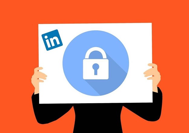 Graphic illustrating a person holding a sign with LinkedIn's logo and a padlock, symbolizing the privacy settings connected to LinkedIn.