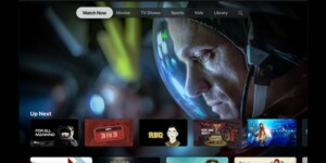 A user interface of Apple TV featuring a grid of movies and TV shows. In the background, an astronaut in a helmet appears focused, illuminated by blue light.